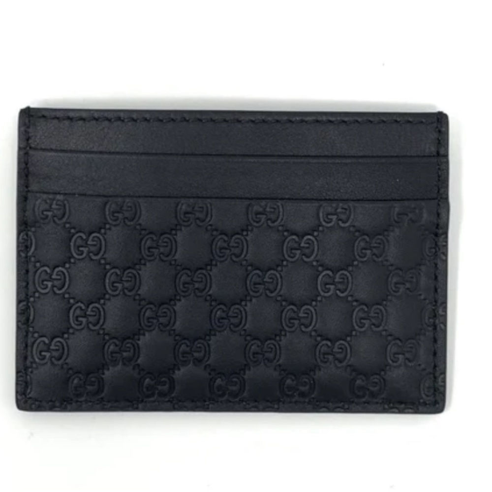 Authentic Gucci Black Micro Guccissma card holder never used.